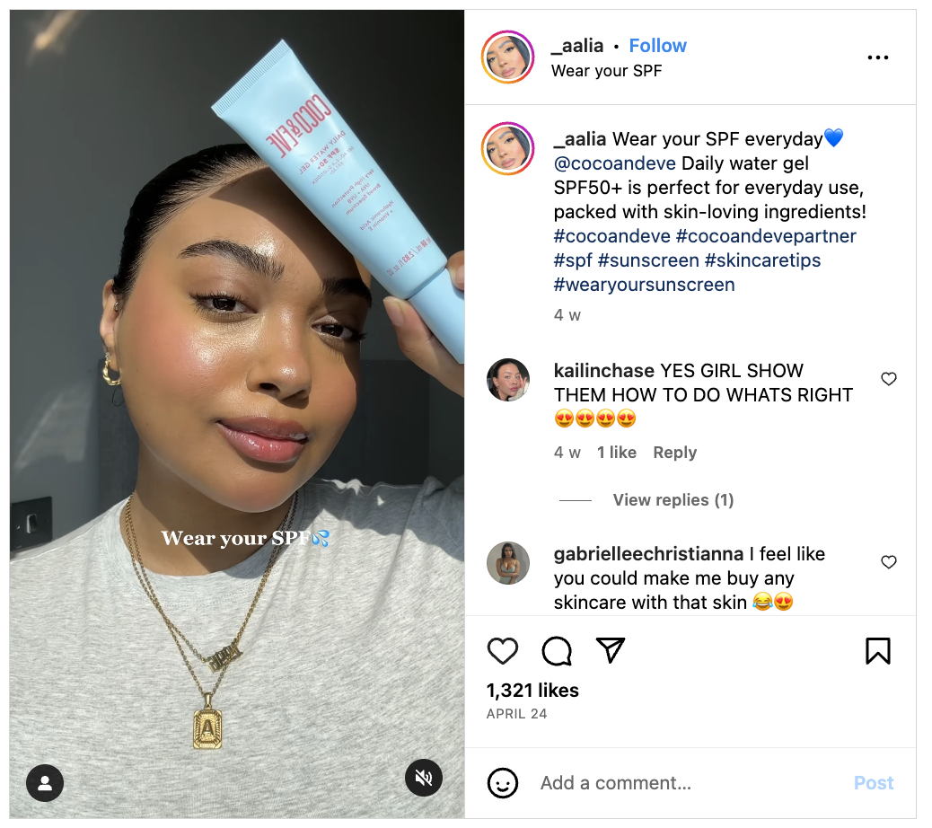 Beauty influencer applies sunscreen while sharing benefits of product